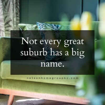 Quote graphic stating “Not every great suburb has a big name,” placed over a cozy green sofa in a softly lit living space.