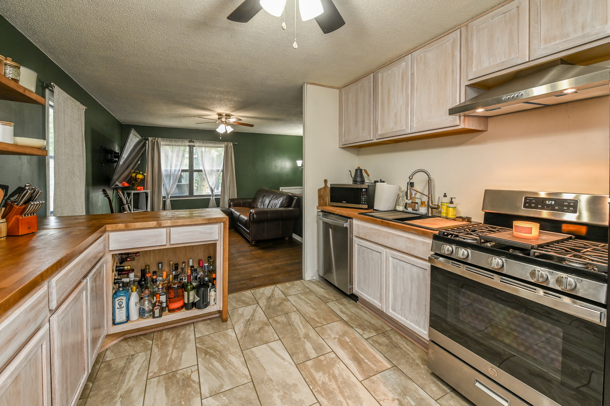 Fully updated kitchen with butcher-block counters and new gas range