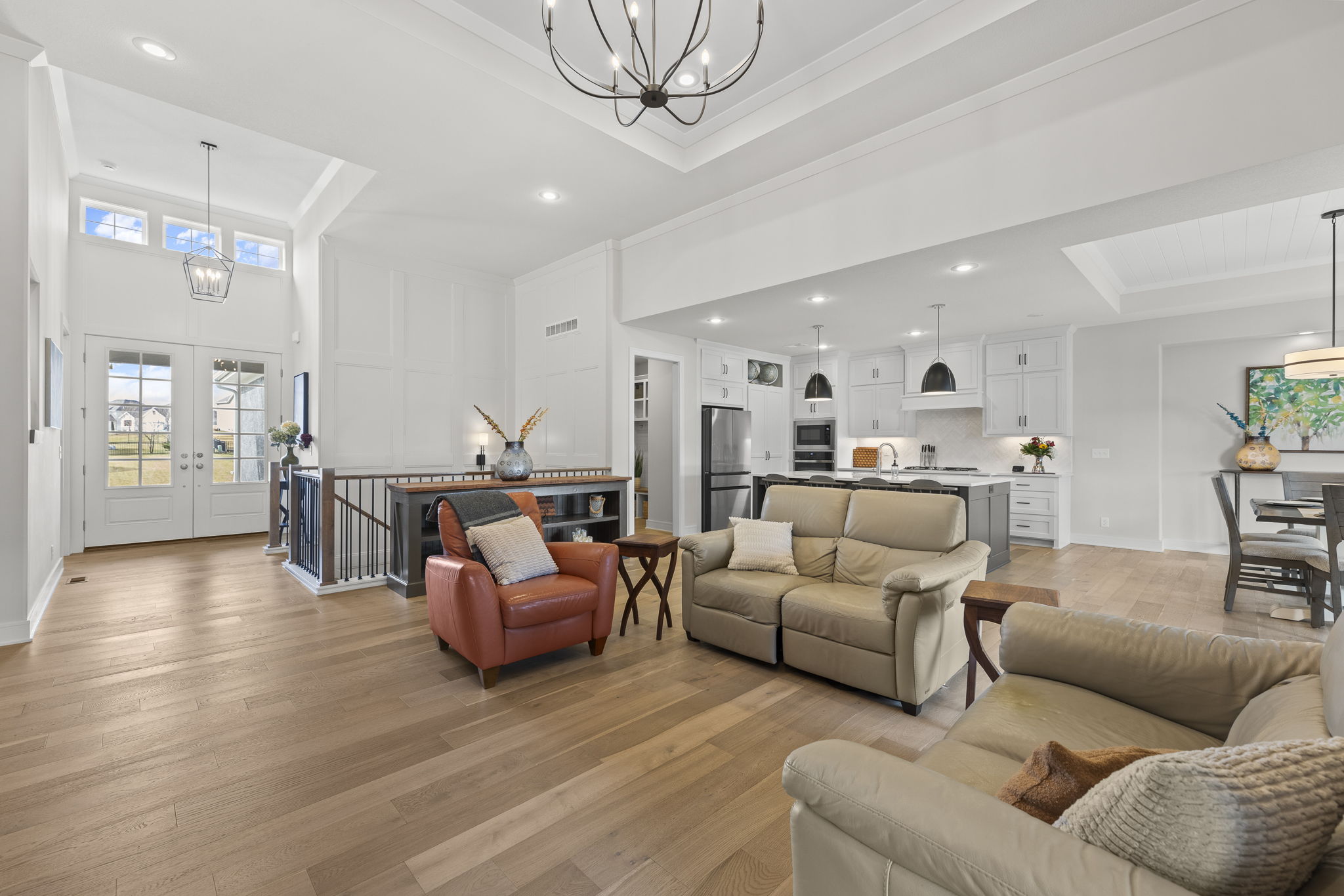 Vaulted main-level living with wide-plank hardwoods