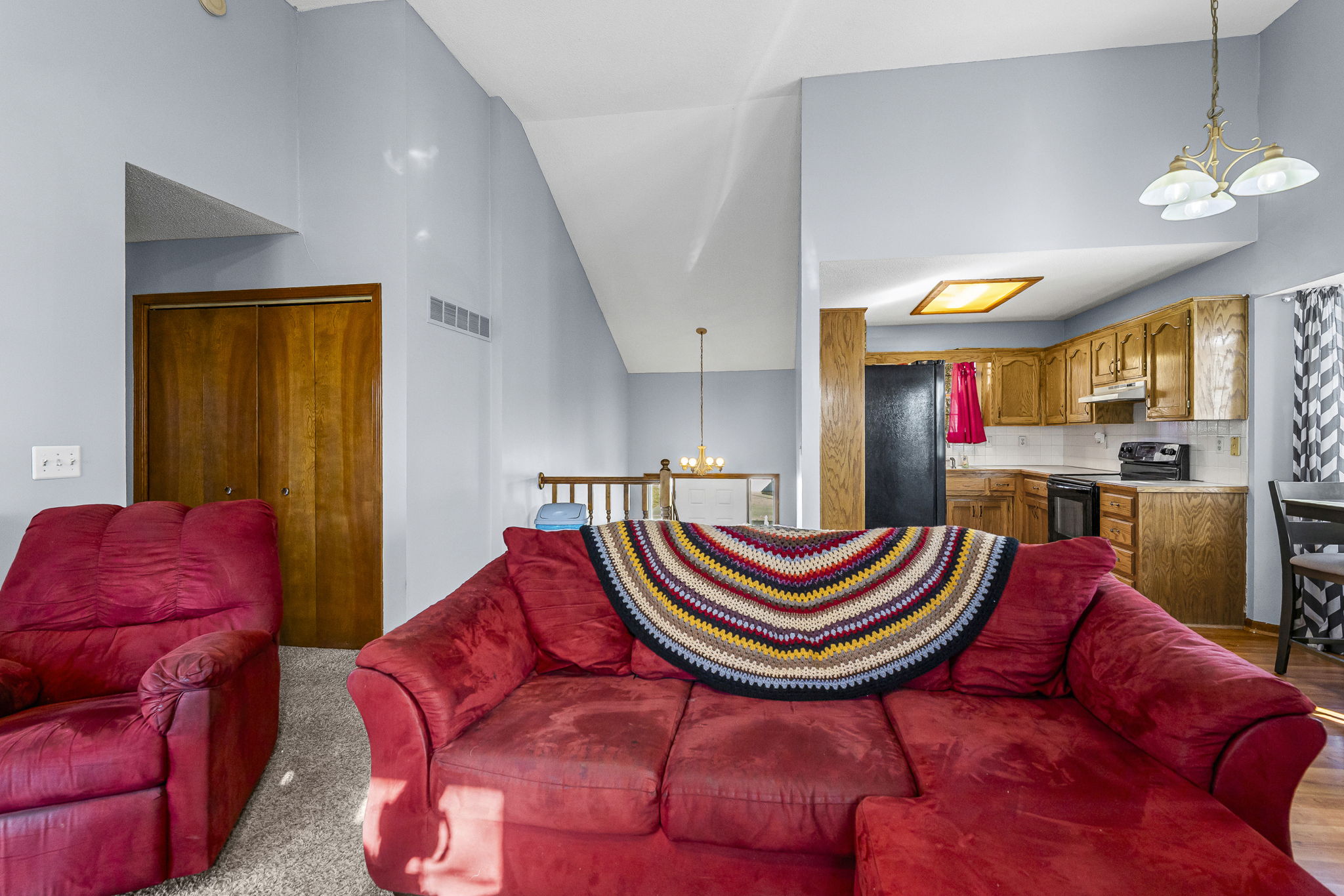 Bright living space open to the eat-in kitchen