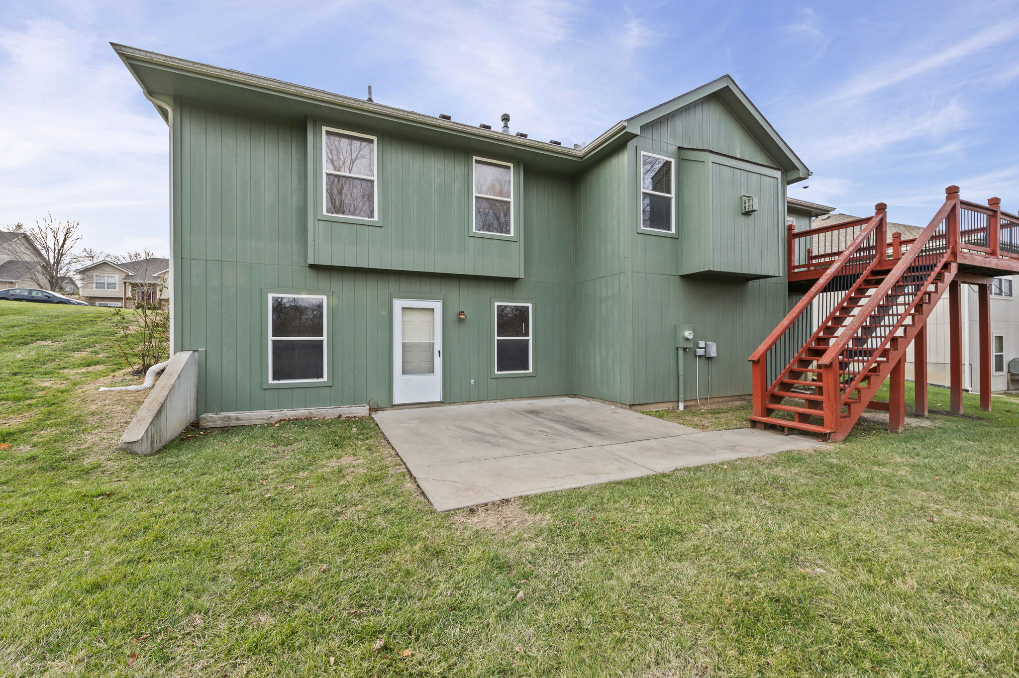 Full walkout basement and deck overlooking the double lot