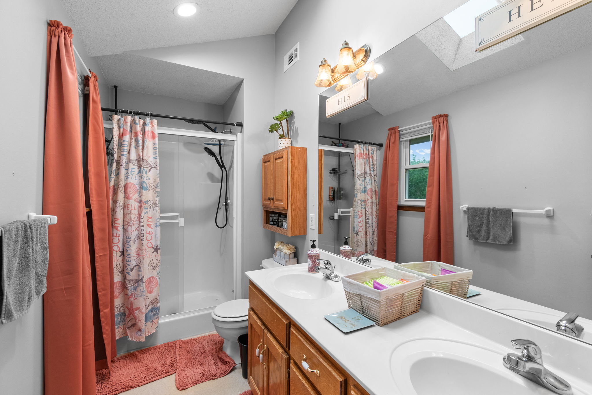 Upstairs primary suite with a private bath