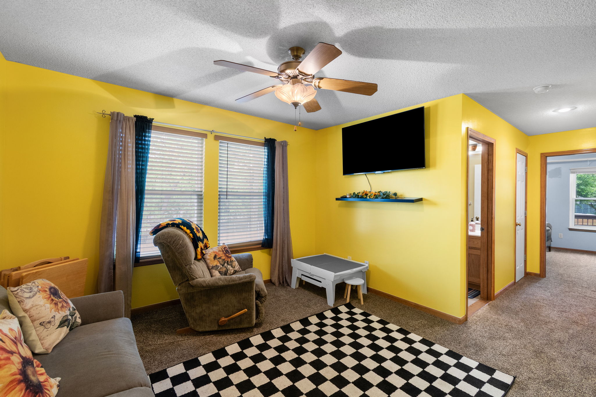 One of four bedrooms, each with a walk-in closet