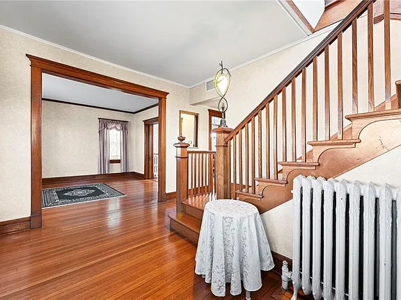 Full-length covered front porch with swing