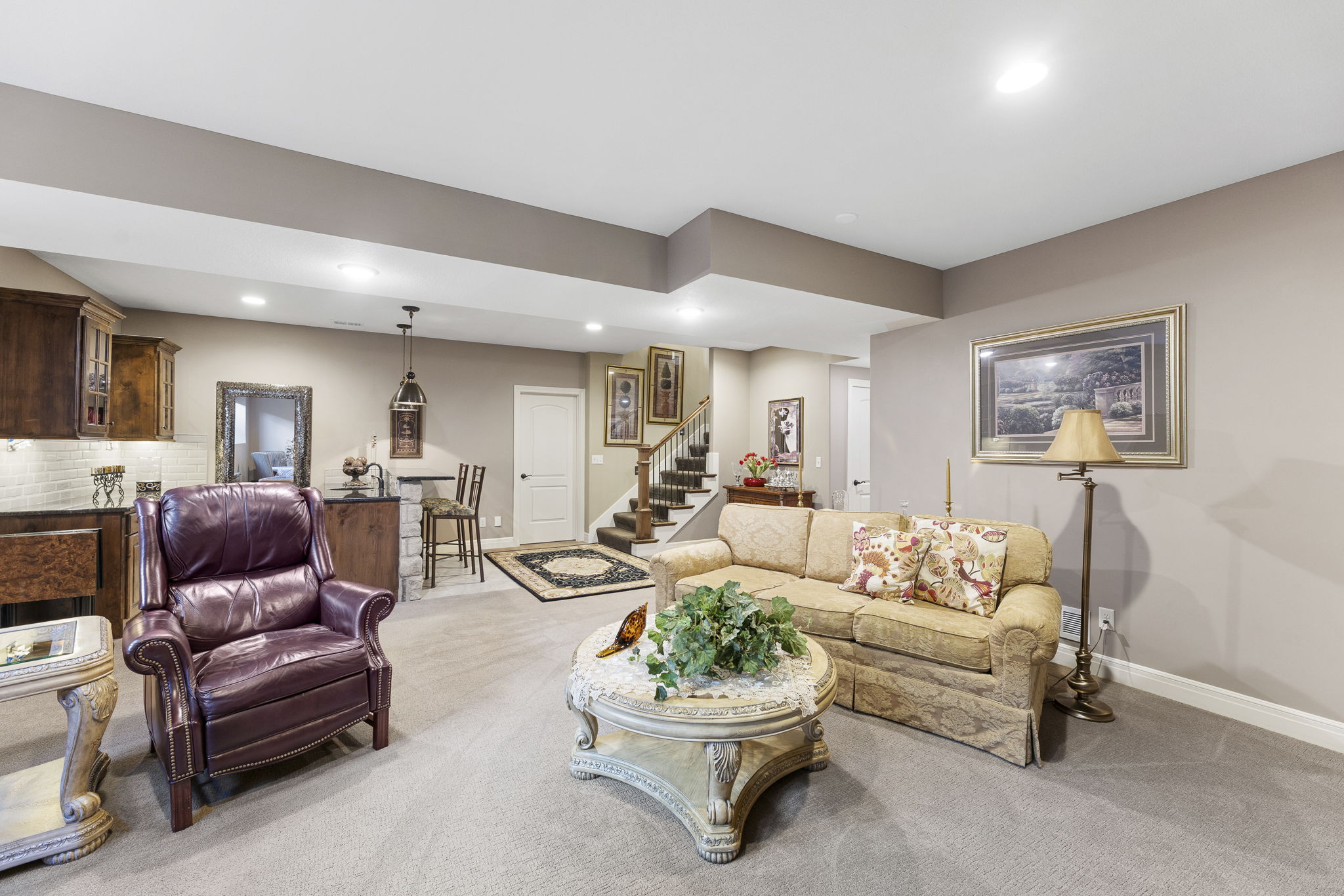 Daylight finished basement — family room, wet bar, and secondary suite