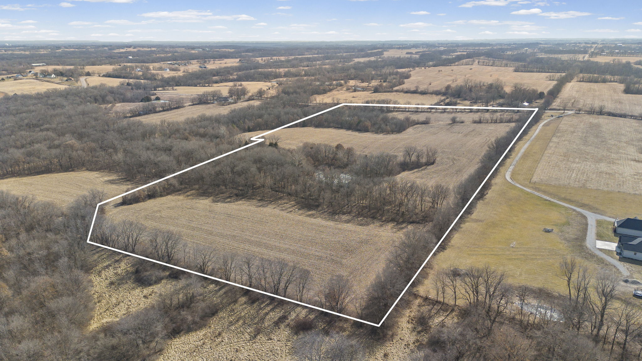 Dead-end blacktop road frontage — rare for rural Clay County