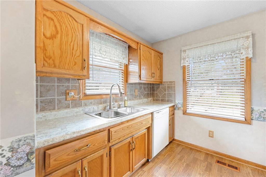 Eat-in kitchen with abundant cabinetry