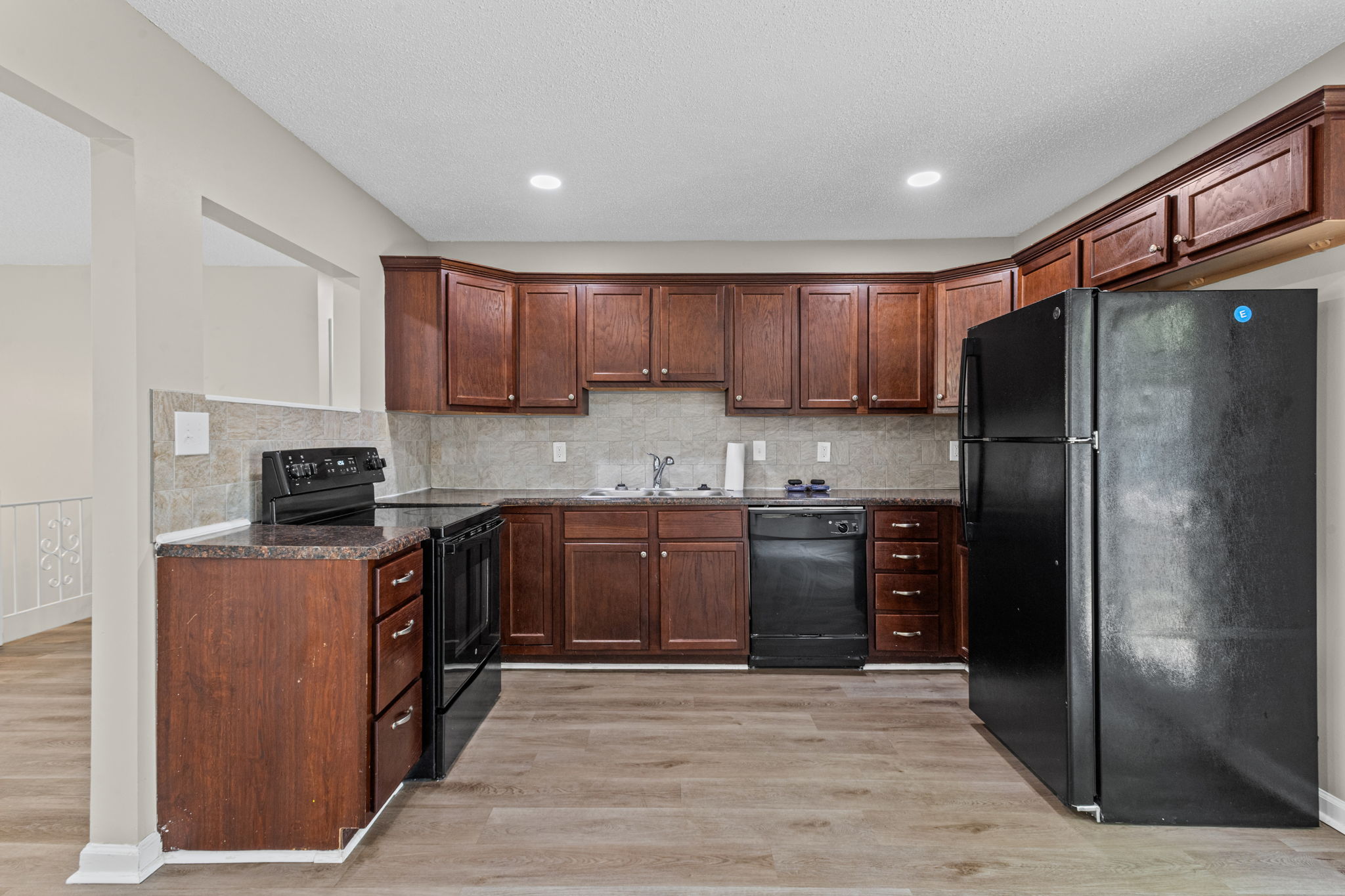 Renovated kitchen with cherry cabinets
