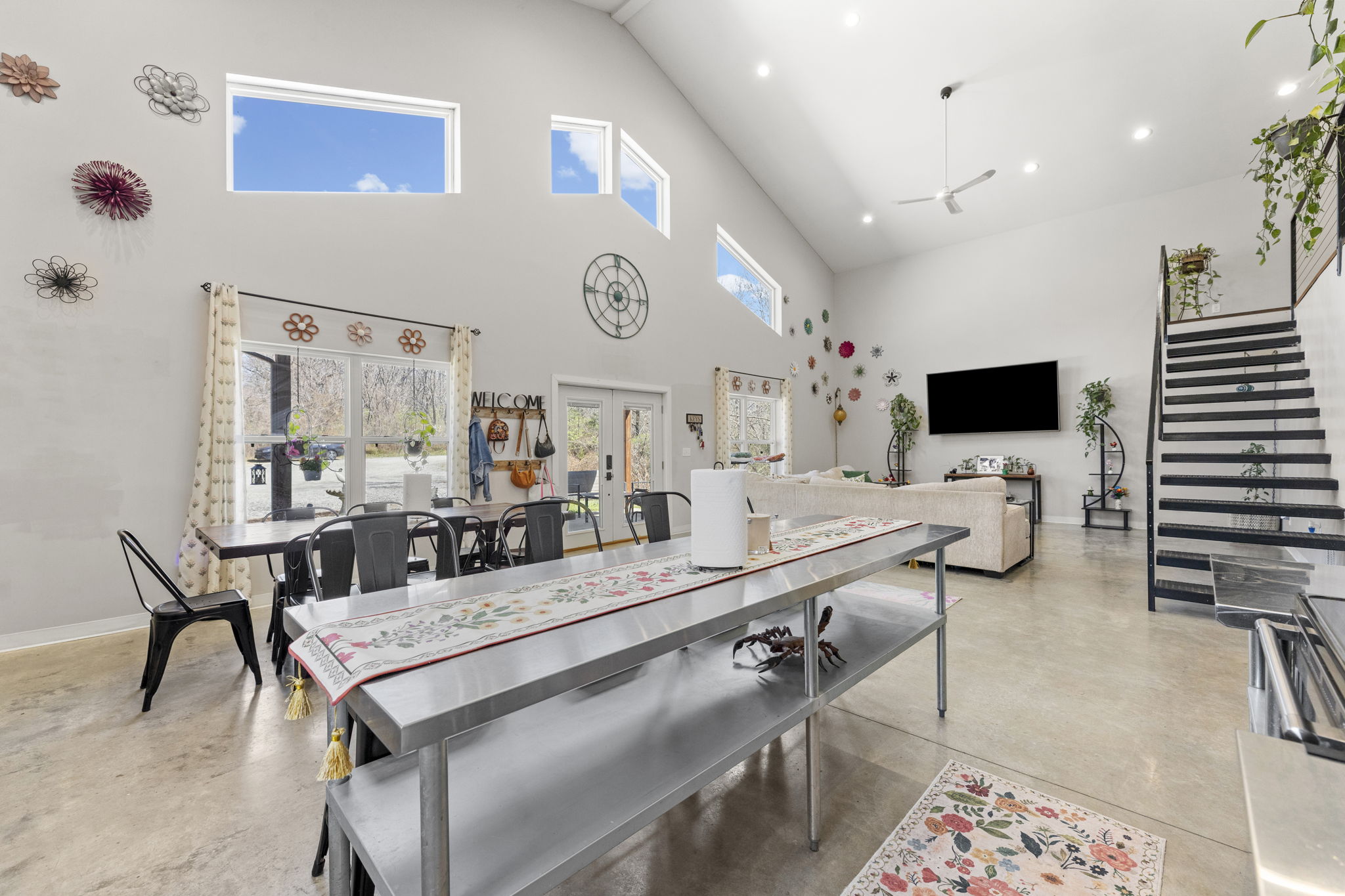 Open living and dining with movable kitchen island