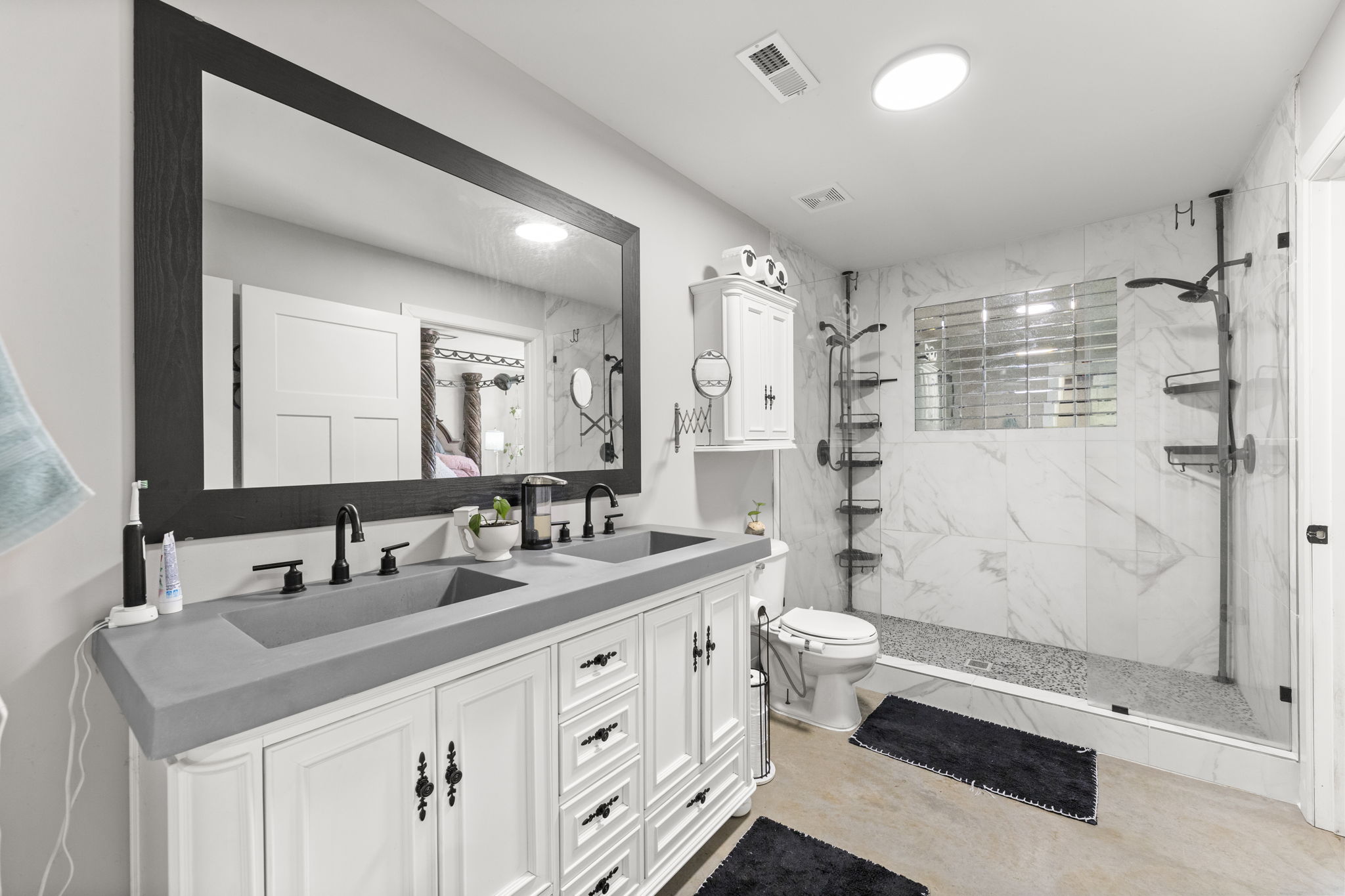 Primary bath with double vanity and walk-in shower