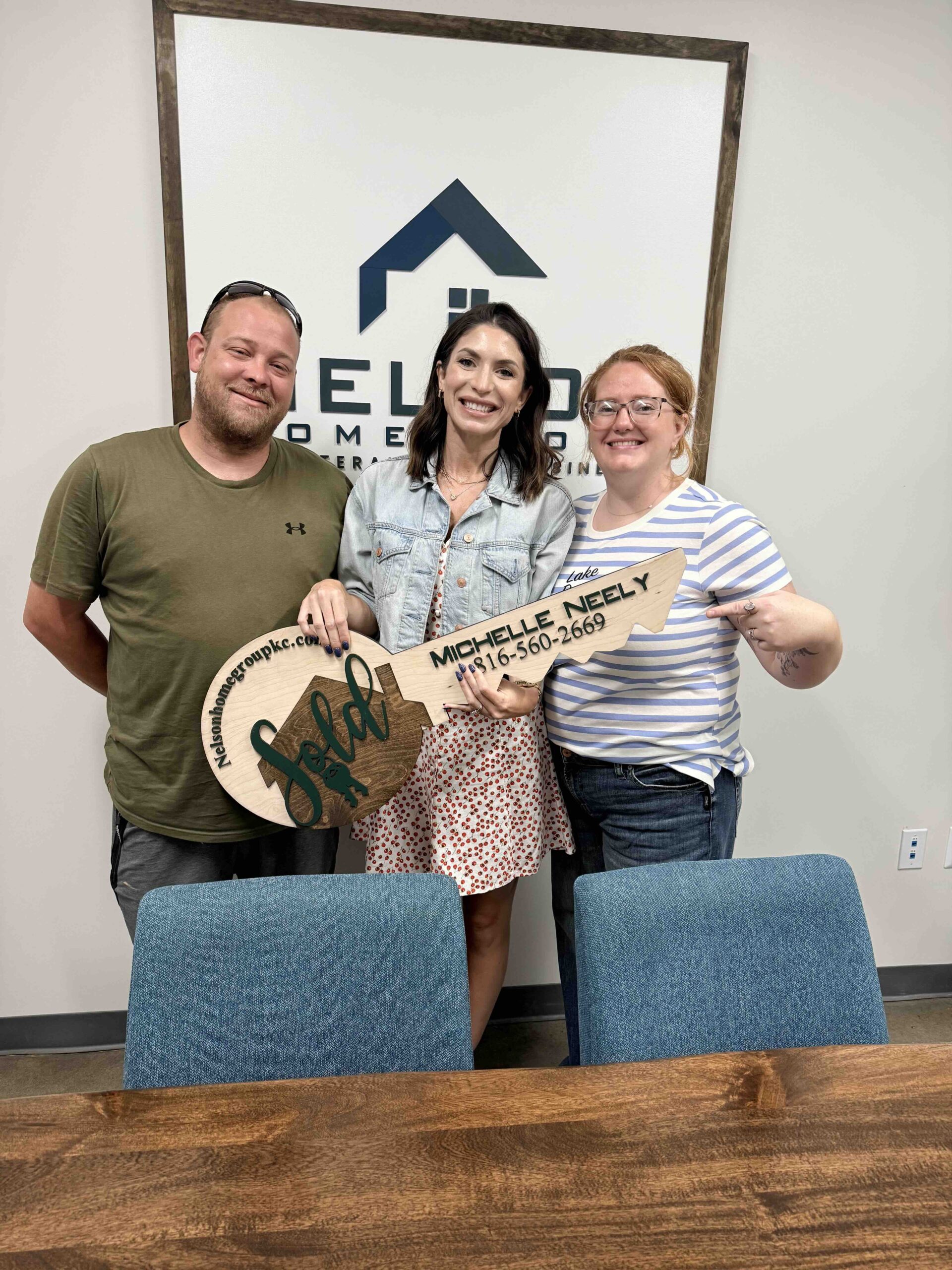 Michael and Amanda at closing with agent Michelle Neely