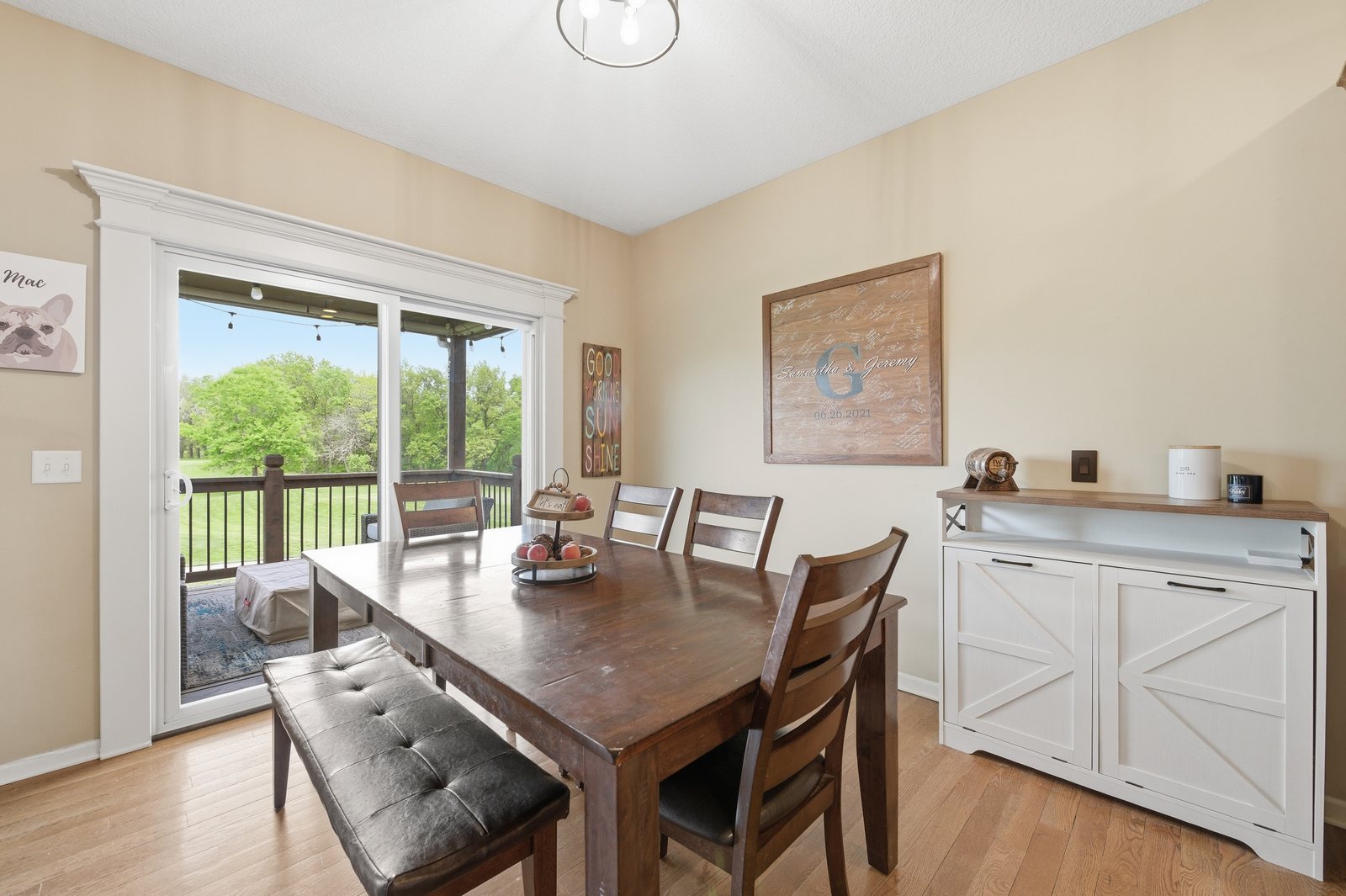 Dining area with deck access overlooking the MariMack golf course
