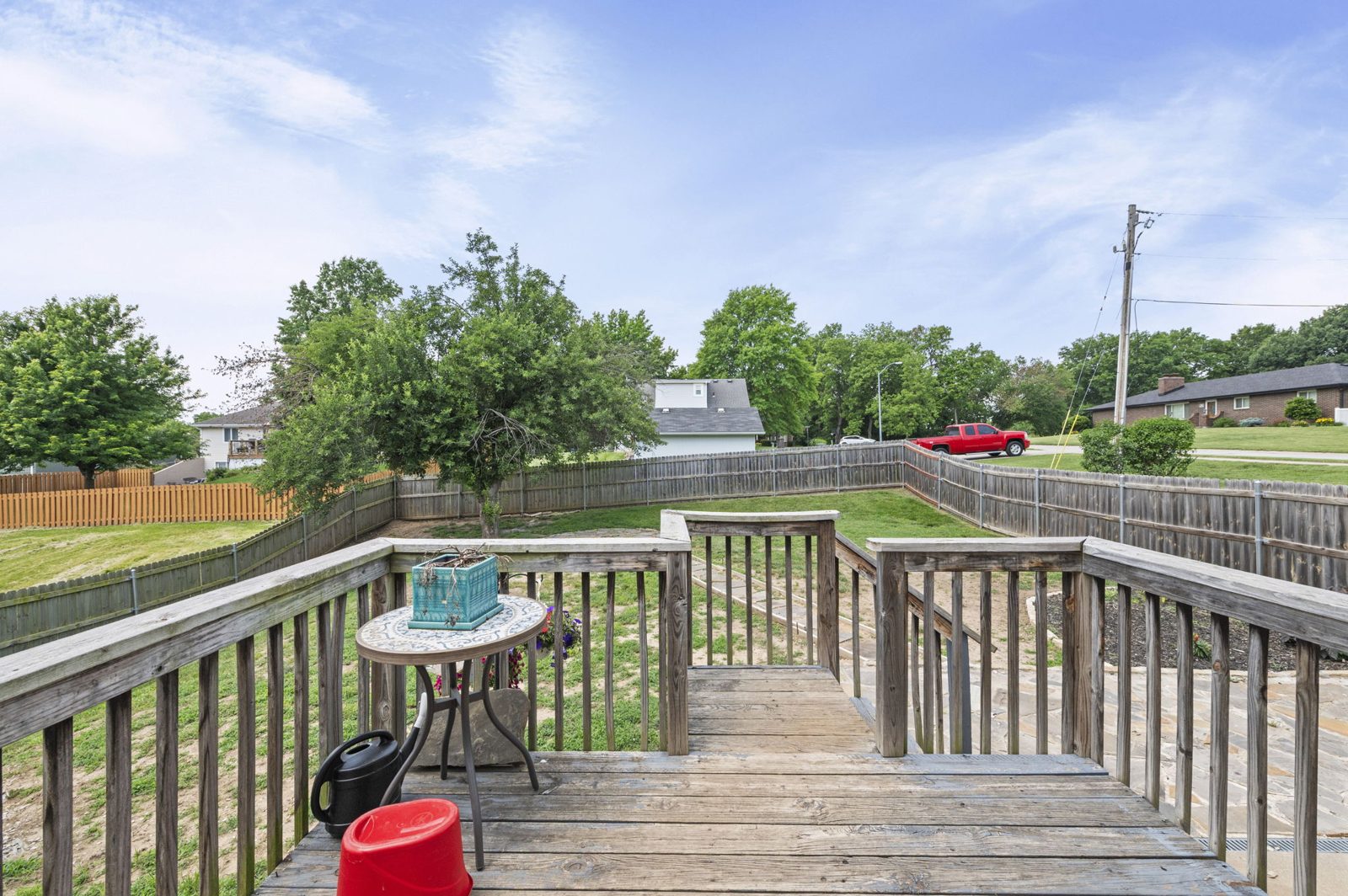Deck overlooking the fenced backyard at 1700 Todd Street